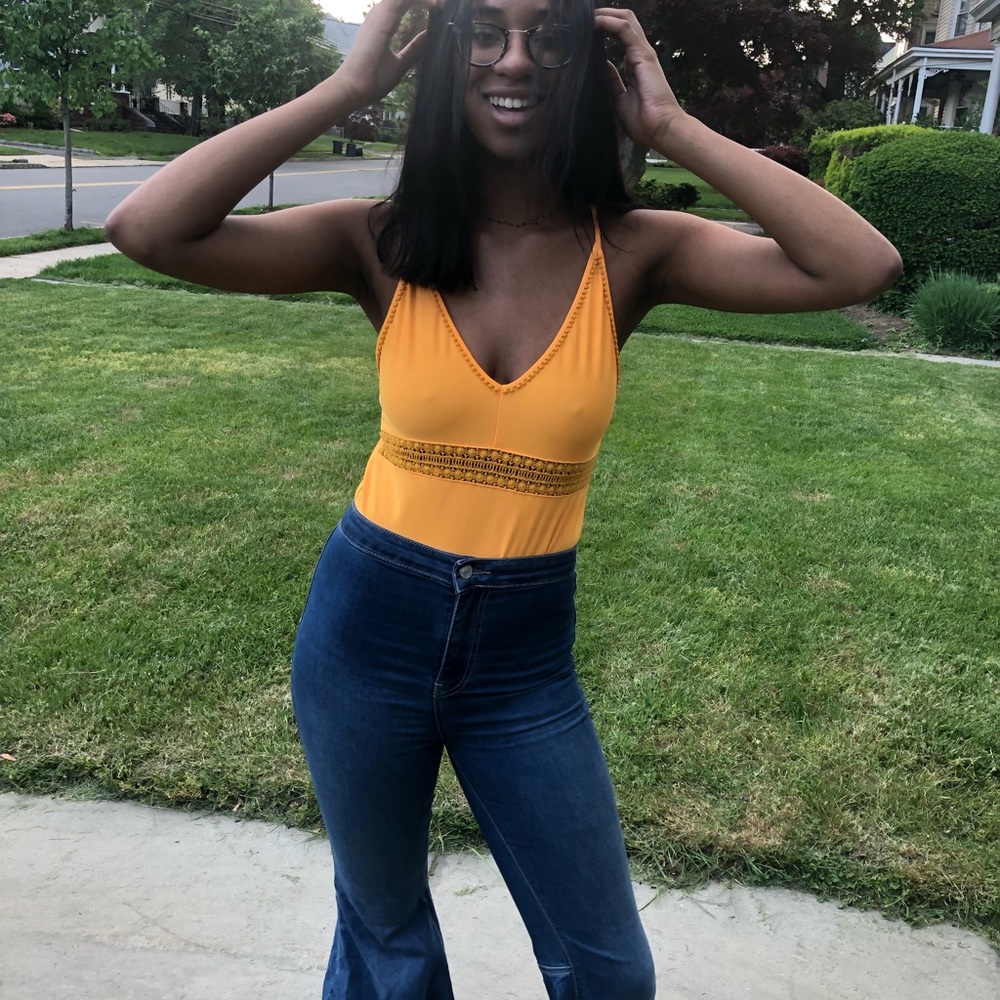 Yellow bodysuit